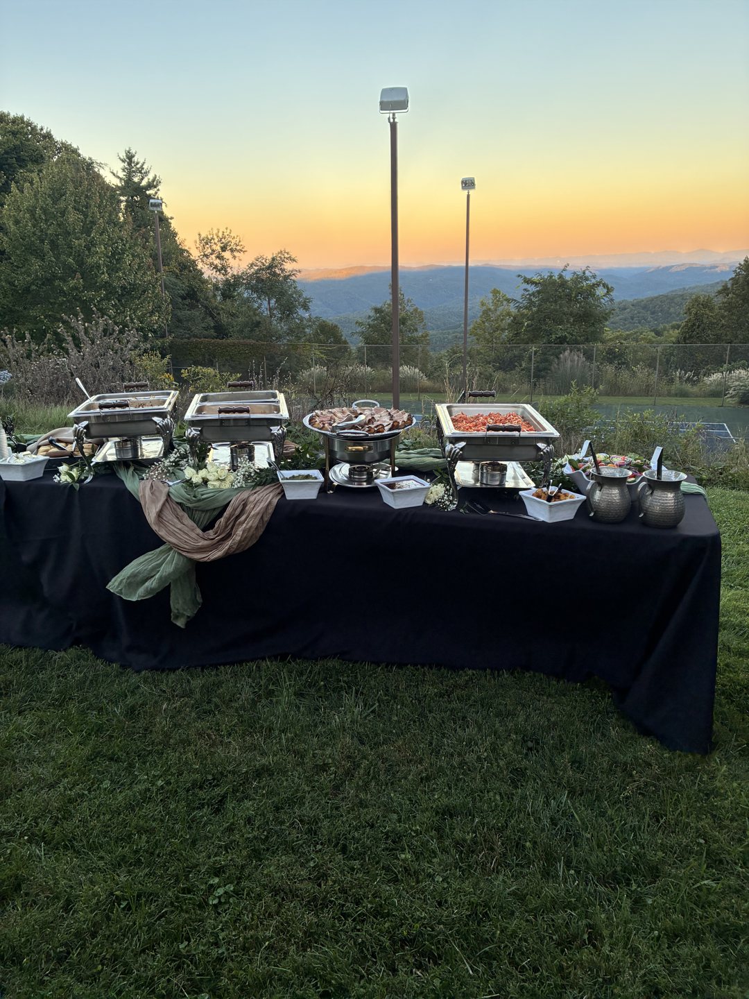 Outdoor buffet service with a High Country mountain view