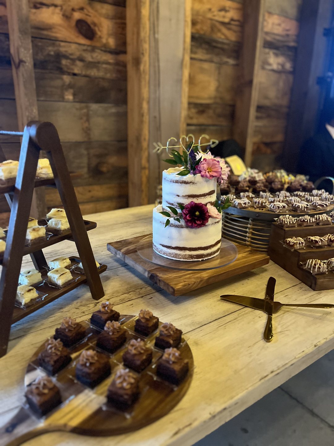 Dessert station with cake and hand-finished sweets